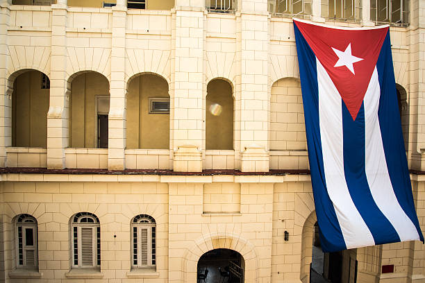 istock Cuban flag on colonial building in Havana, Cuba 490762016