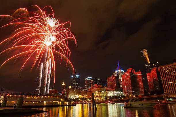 istock Pittsburgh, PA river view skyline at night with colorful firewor 490772289