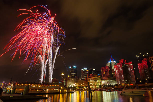 istock Pittsburgh, PA river view skyline at night with colorful firewor 490772291