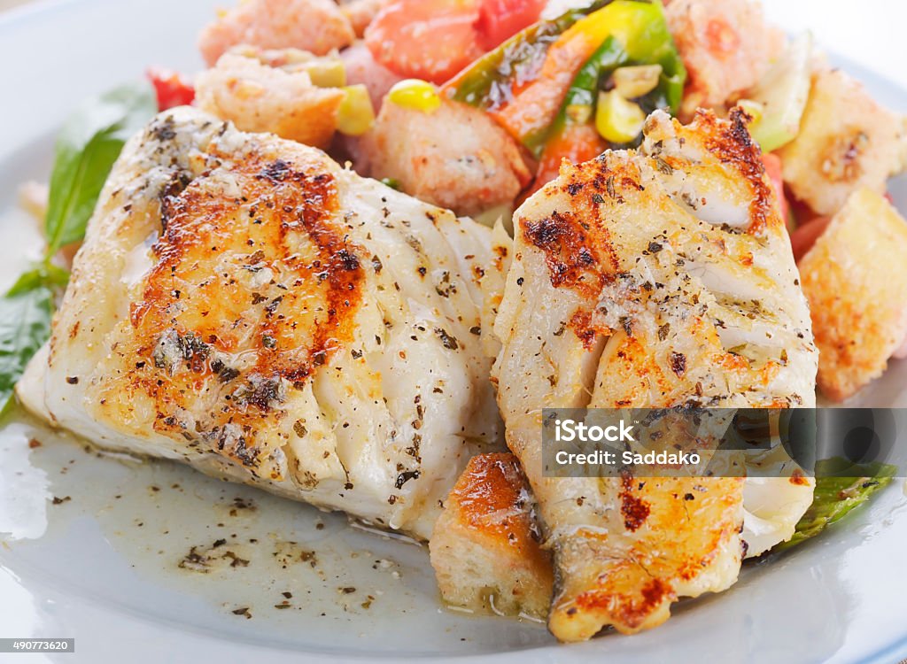 Mahi Mahi Fillets with Salad Seared Mahi Mahi Fillets with Vegetables and Sauce Dolphin Fish Stock Photo