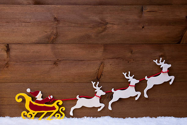 istock Santa Claus Sled With Reindeer, Snow 490774168