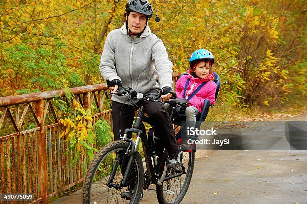 Father And Kid On Bike In Autumn Park Stock Photo - Download Image Now - Child, Cycling, People