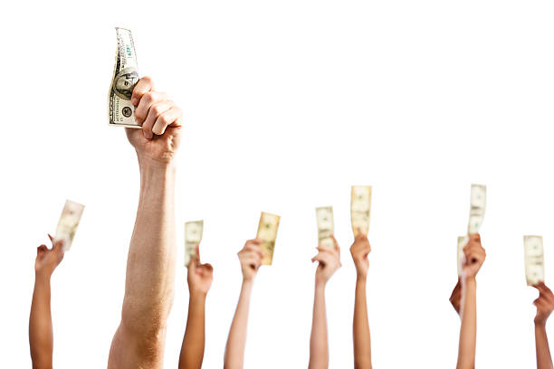 istock I'll pay! No, me! Many hands waving banknotes enthusiastically 490775271