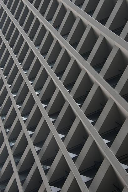 istock Skyscraper facade showing grid of concrete girders 490776023