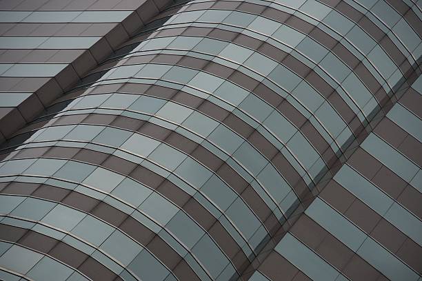 istock Angled view of green and grey skyscraper 490776871