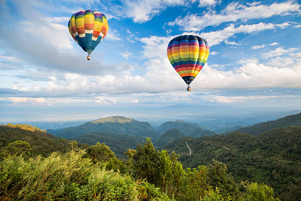 istock Hot air balloon over the mountain 490777383