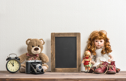 Doll, Teddy Bear, chalkboard and vintage toys