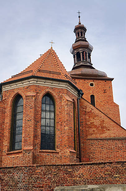 istock Gothic parish church behind the wall 490780558