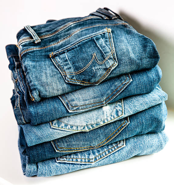 istock Lot of different blue jeans Jeans. clothes 490780616