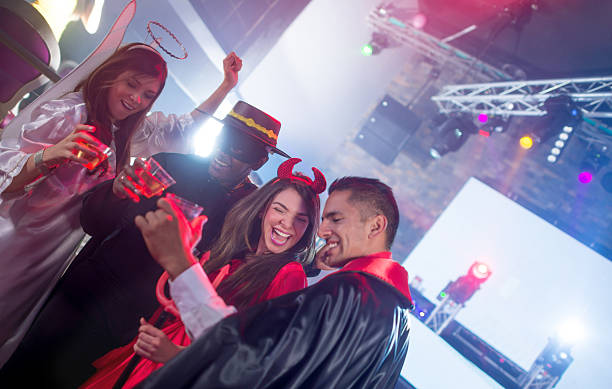 istock Friends at a Halloween party 490781070