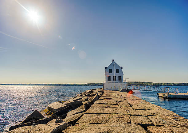 Rockland Harbor Breakwater Light In Maine The Rockland Harbor Breakwater Light in Rockland, Maine. groyne stock pictures, royalty-free photos & images