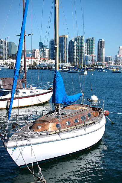 Sail boats at marina with San Diego downtown in the background
