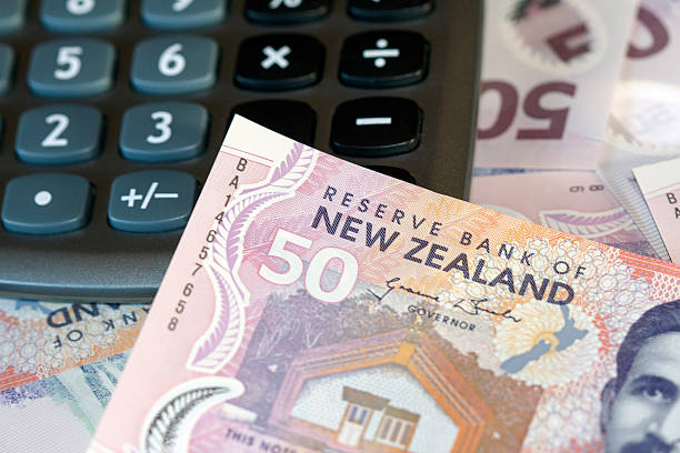 New Zealand Currency and Calculator stock photo