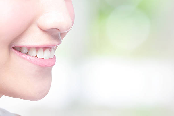 istock young woman health teeth 490786180