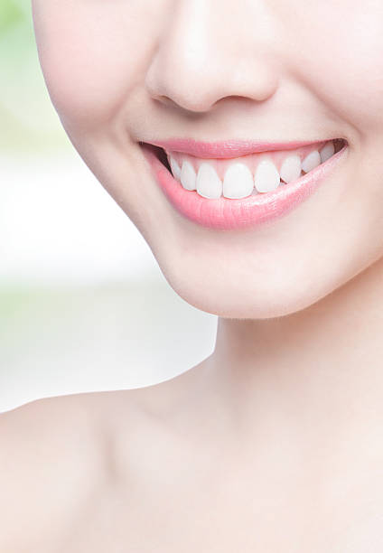 istock young woman health teeth 490786292