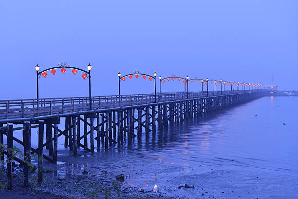 istock Red Lanterns on White Rock Pier for Chinese Moon Festival 490796376