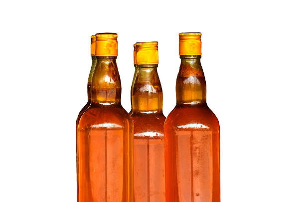 istock Honey in glass bottle 490797709