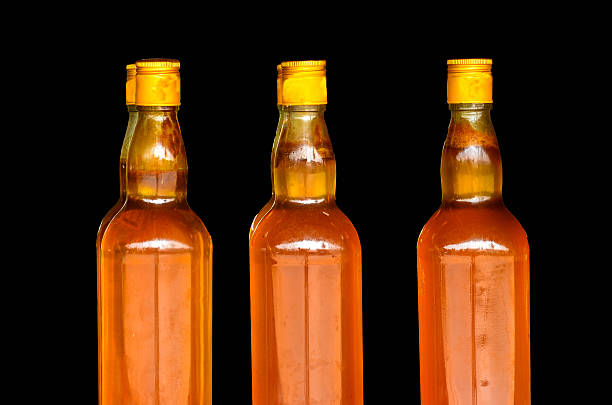 istock Honey in glass bottle 490797711
