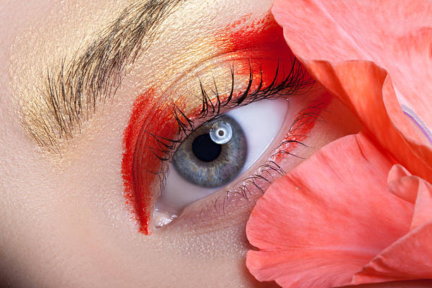 istock Beautiful eye make-up and flowers. 490798604