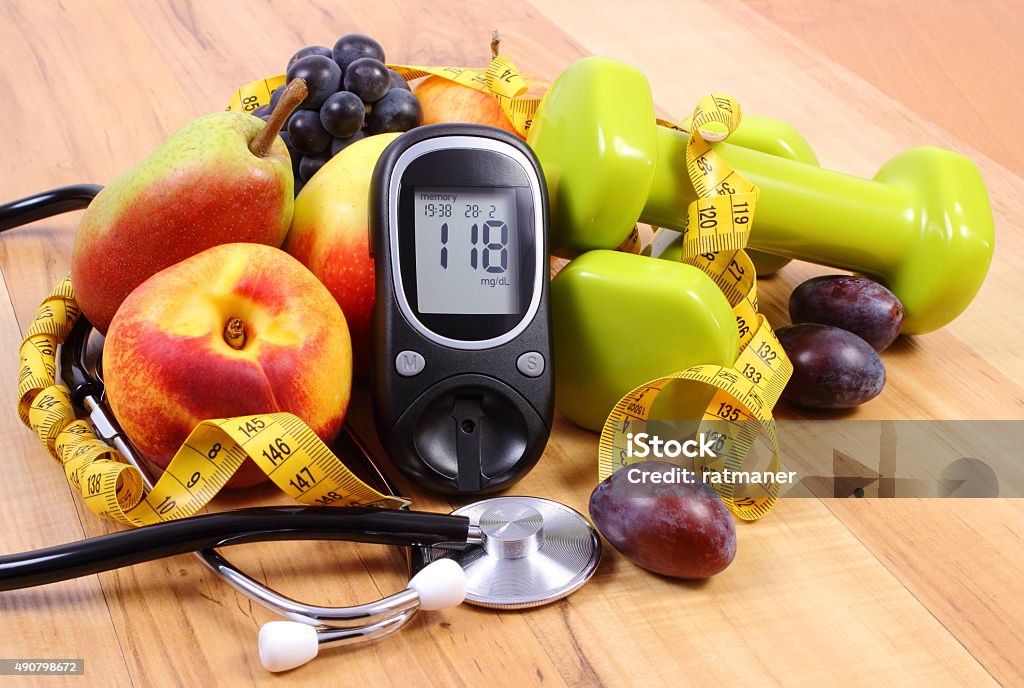 Glucose großen mit medizinische Stethoskop, Obst und Hanteln - Lizenzfrei Diabetes Stock-Foto