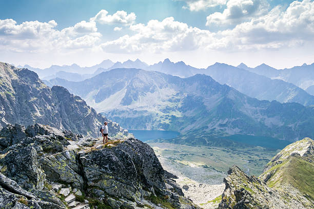 istock Middle aged man enjoying adventure in the mountains 490799028