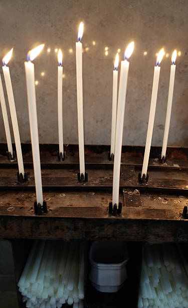 istock Prayer candles in church 490799535