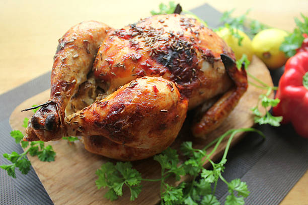 istock Grilled whole chicken with lemon and parsley 490800593