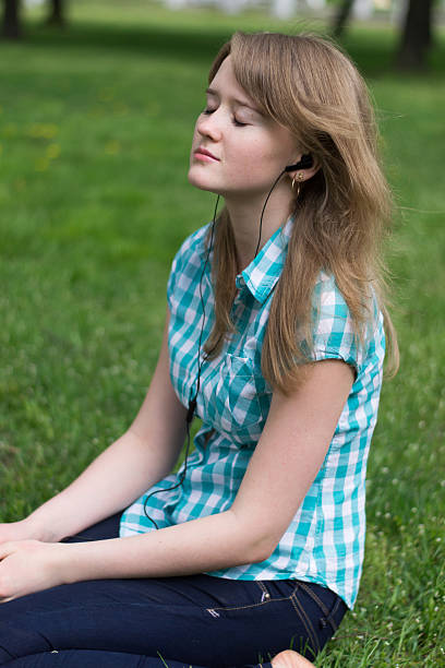 istock girl with headphones 490802447