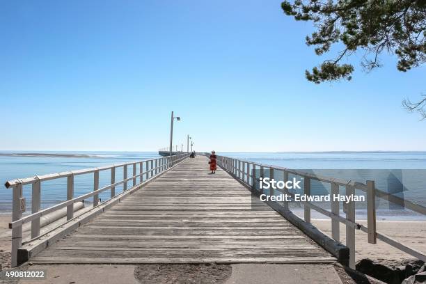 Lady On The Pier Stock Photo - Download Image Now - Hervey Bay, Queensland, Australia