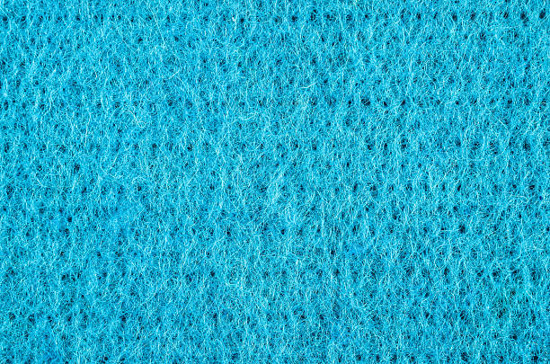 istock Cyan fleece textile fabric background 490813668