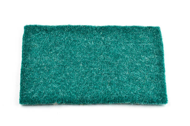 istock Green cut out textile patch on white background tilt viewpoint 490814044
