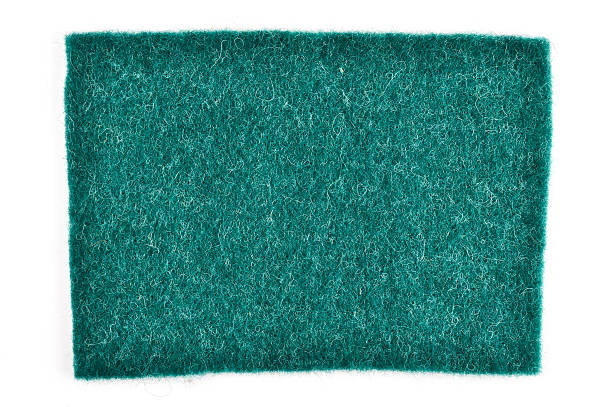 istock Green cut out textile patch on white background directly above 490814064