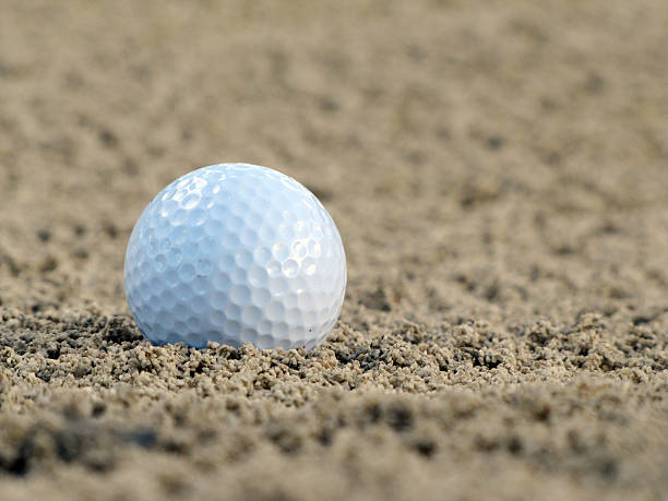 istock golf ball on the green 490814502