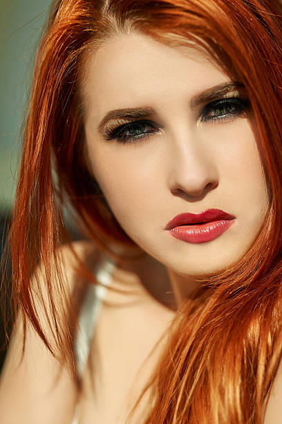 istock attractive red hair woman 490815396
