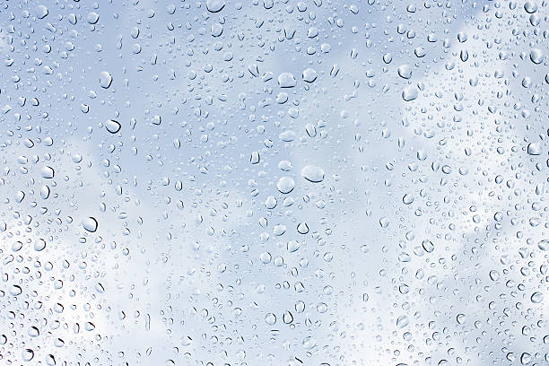 istock Drops of rain on glass , rain drops on clear window 490815544