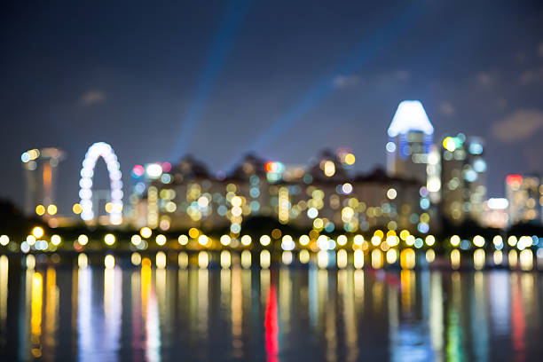 istock Singapore city night lights blurred bokeh 490816128
