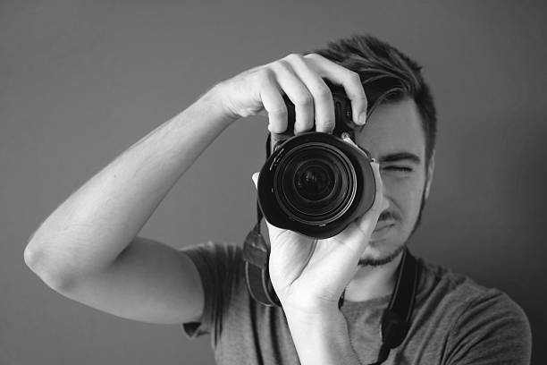istock Man Photographer Black And White 490817408