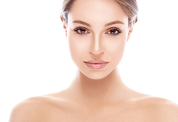 istock Beautiful woman face close up studio on white 490818282