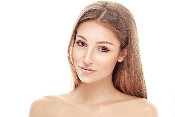 istock Beautiful woman face close up studio on white 490818410