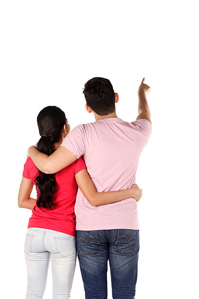 istock Young asian couple pointing something 490818554