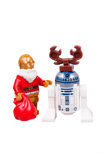 Adelaide, Australia - October 02, 2015: A studio shot of a C3-PO and R2-D2 Christmas Lego minifigure issued in the 2015 Star Wars Lego Advent Calendar. Lego is extremely popular worldwide with children and collectors.
