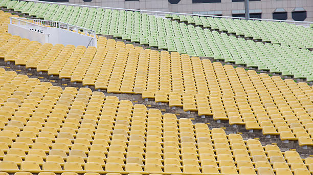 istock Stadium seats in yellow and green color 490820553