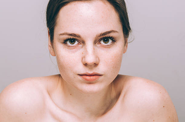 istock beautiful woman face portrait young 490821148