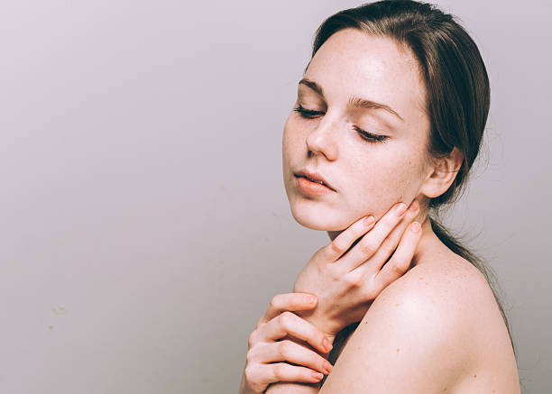 istock beautiful woman face portrait young 490821246