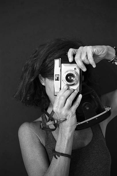 Woman Photographer Black And White stock photo