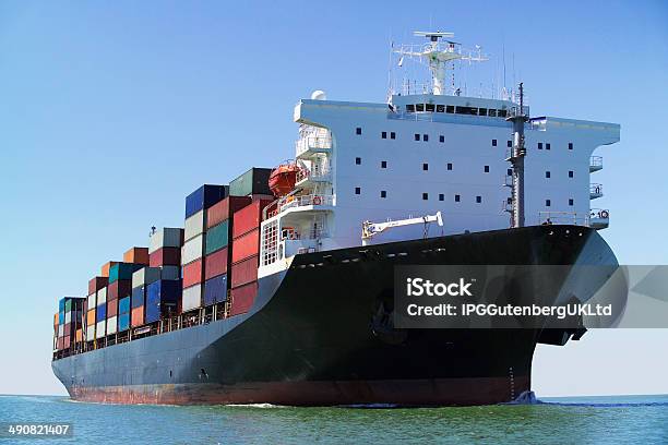 Container Ship On Ocean Stock Photo - Download Image Now - Container Ship, Day, Horizon Over Water