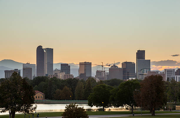 istock Denver downtown skyline and rocky mountain at sunset. 490821461