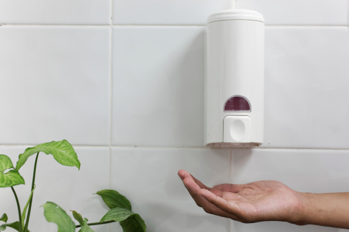 one hand under the hand wash-Automatic soap dispenser.