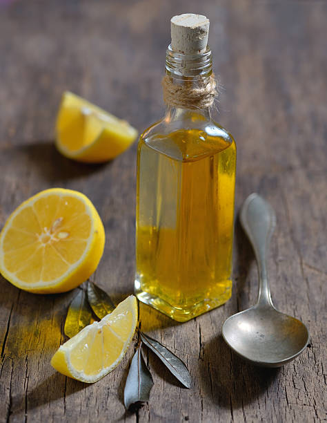 Liver Detox with olive oil and  lemon fruits stock photo