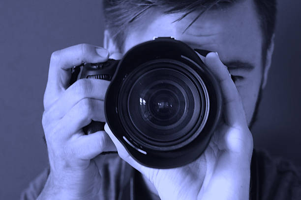 istock Close-Up To Photographer With Purple filter 490822320